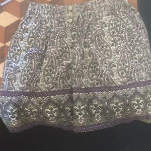 Just above the knee skirt